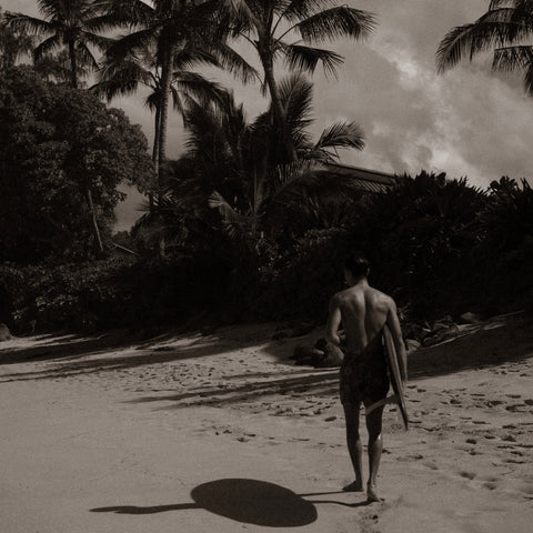 Kaimana in Hawaii with his surfboard 